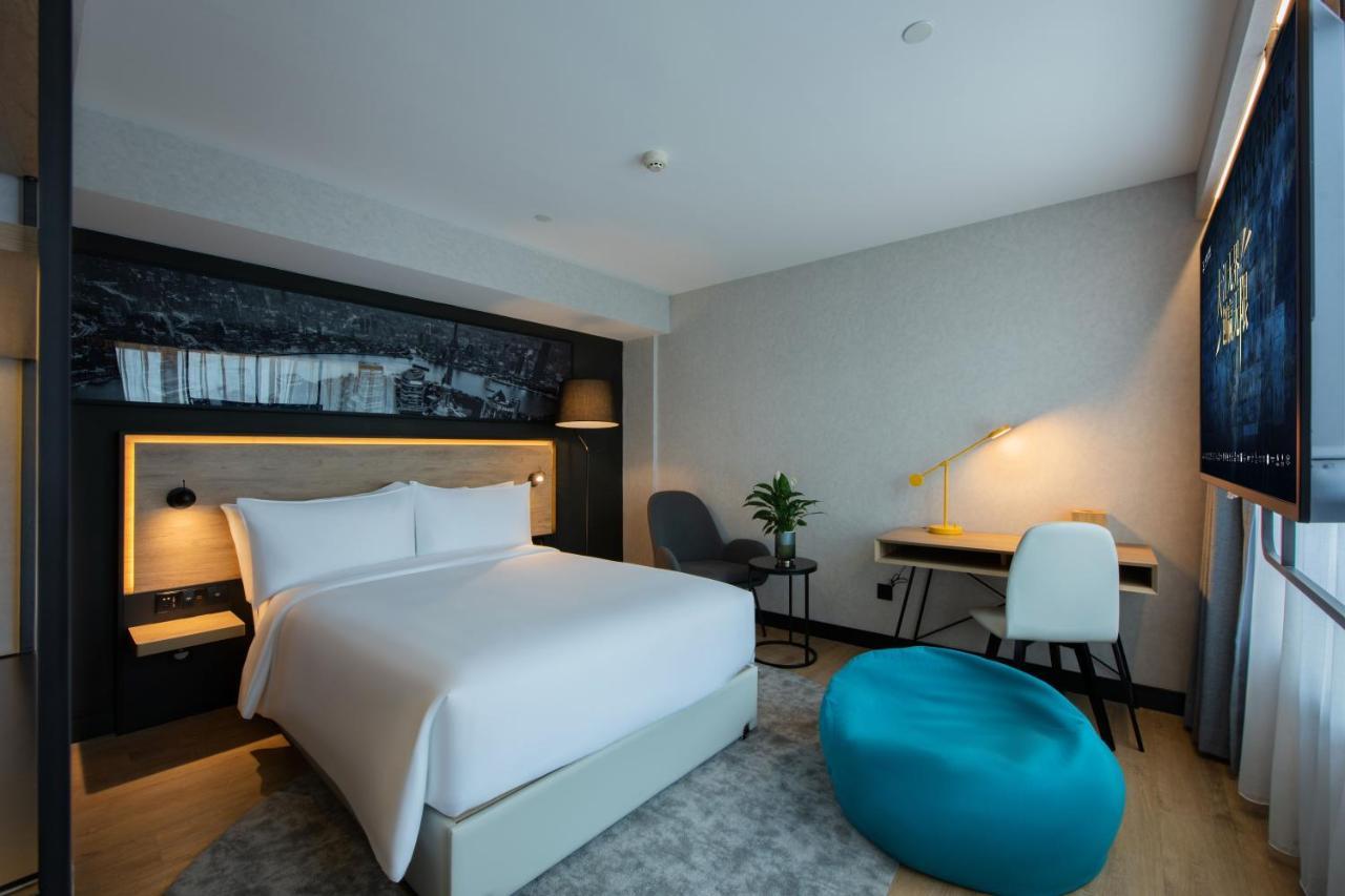 Park Inn By Radisson Shanghai Huanqiugang Exterior foto